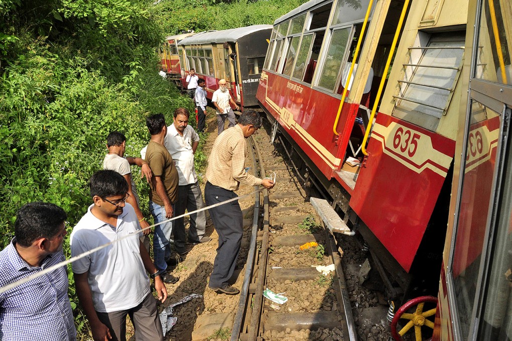 Dubbed the "toy train," tourists were on their way to the hill town of Shimla in northern India. Photo: AFP