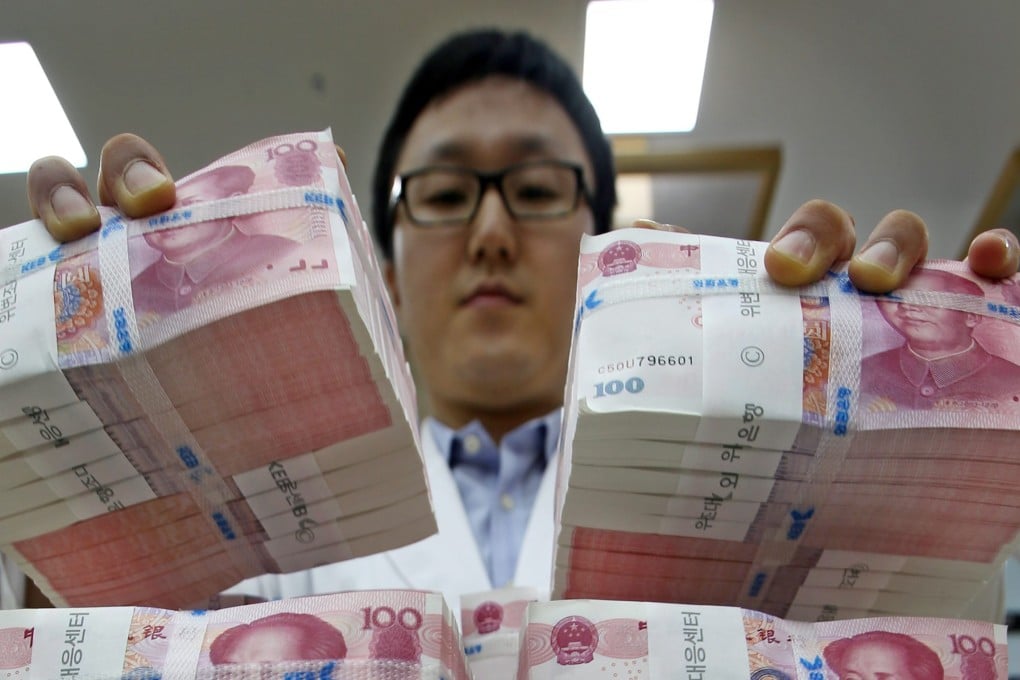 China devalued the yuan on August 11 and has been spending heavily to hold the currency steady onshore as fears have grown that the economy is in worse shape than previously thought. Photo: EPA