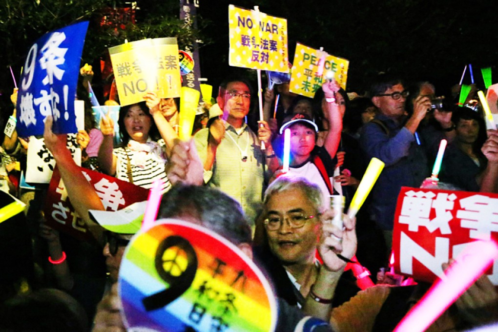 Protesters rally against Japanese Prime Minister Shinzo Abe's controversial security bills aimed at expanding the remit of the country's armed forces. Photo: AFP