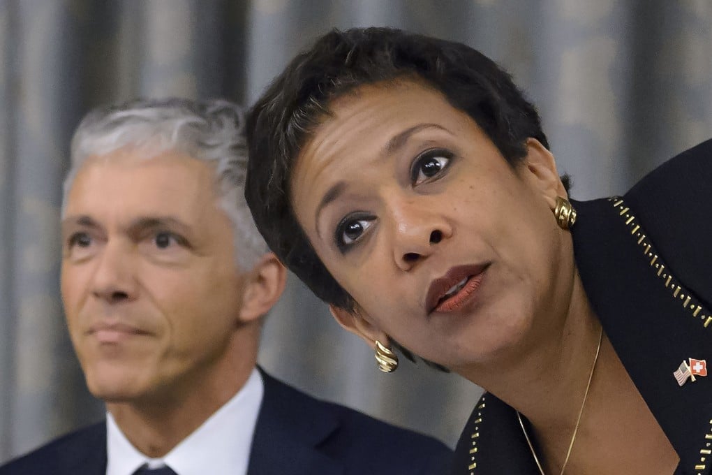 Loretta Lynch and Michael Lauber. Photo: AFP