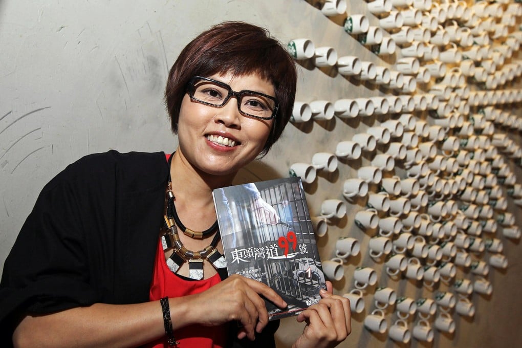 Grace Woo with the book based on her internet radio show.