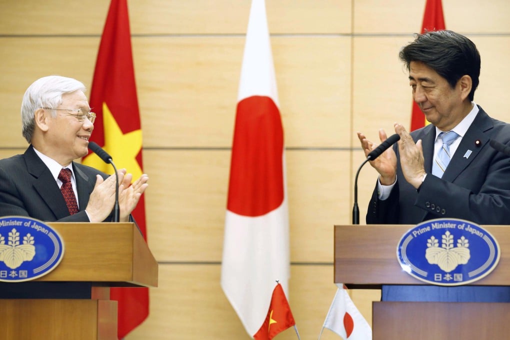 Nguyen Phu Trong, general secretary of Vietnam's ruling Communist Party, and Japanese Prime Minister Shinzo Abe discussed tensions in the South China Sea. Photo: Kyodo