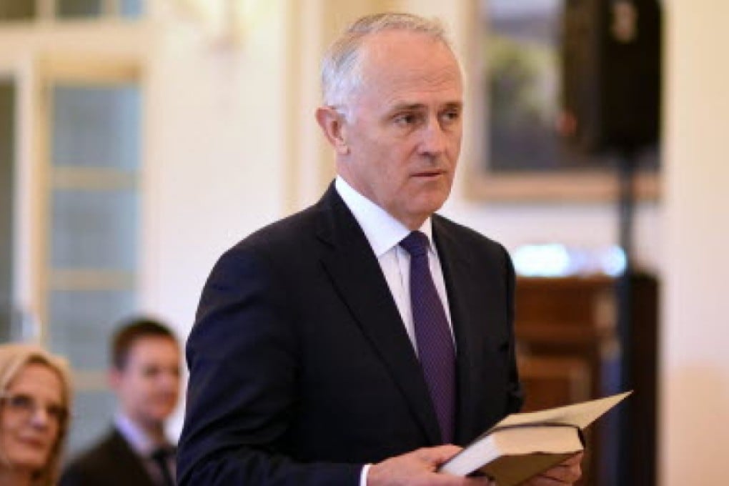 Malcolm Turnbull is sworn in as Australia's new prime minister in Canberra on Tuesday. Photo: EPA