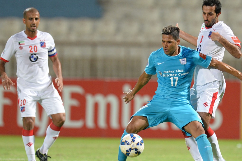 Fahad Awad Shaheen (right) of Al Kuwait SC vies with Paulo Carreiro (centre) of Kitchee in their AFC Cup game. Photo: Xinhua