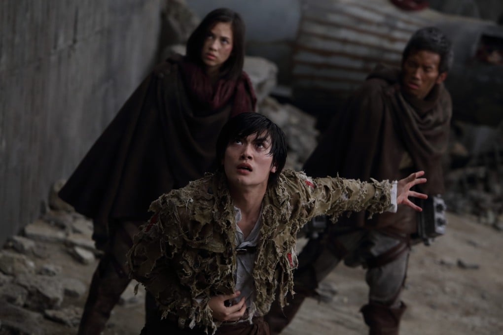 Haruma Miura (centre) leads the fight in Attack on Titan: End of the World. The film (Category IIB) also stars Kiko Mizuhara (left) and Kanata Hongo and is directed by Shinji Higuchi