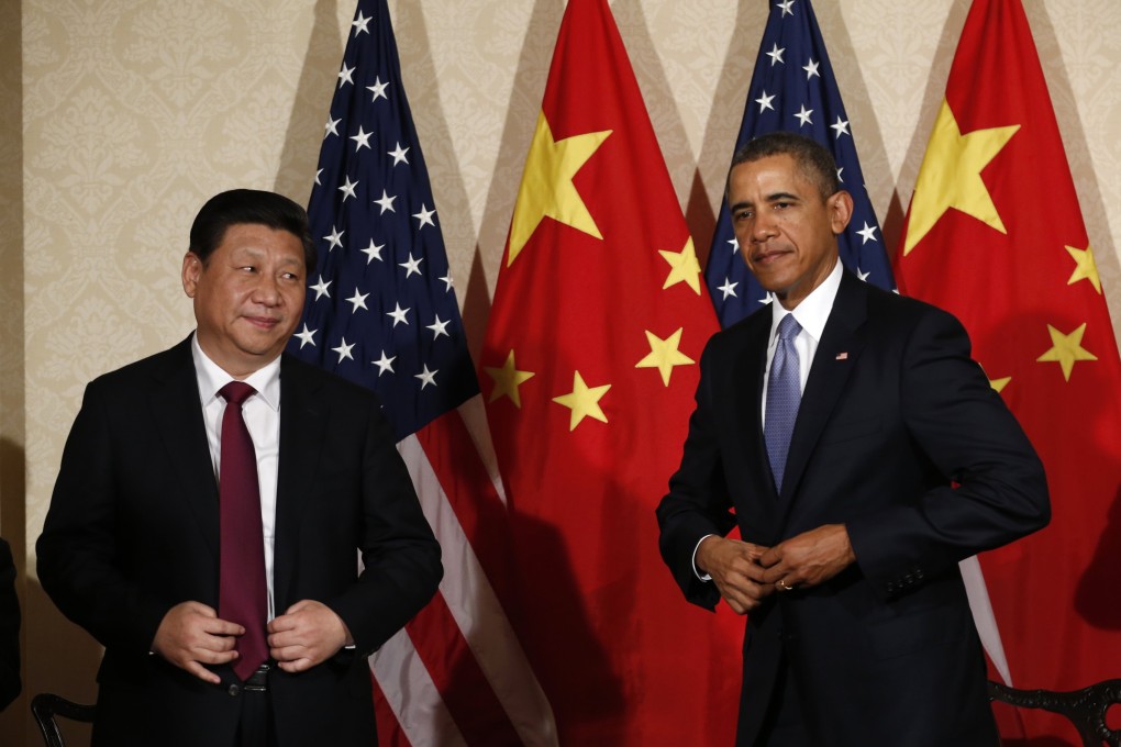 President Xi Jinping and Barack Obama pictured last year on the sidelines of a nuclear summit in the Netherlands. Photo: Reuters