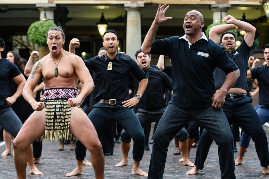 Jonah Lomu joins members of the Ngati Ranana London Maori Club to perform a haka at Covent Garden ahead of the Rugby World Cup in England. Photos: AFP