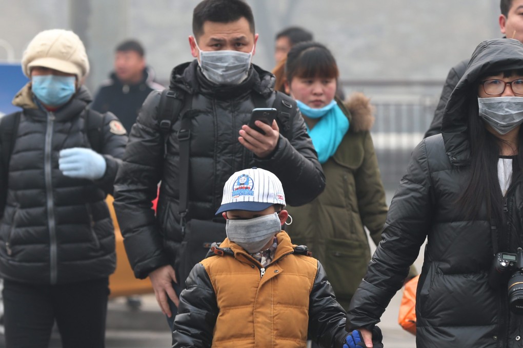 People in Beijing and many other cities in northern China are back wearing face masks following the return of thick smog. File photo: EPA