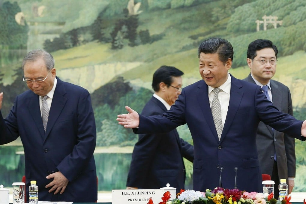 President Xi Jinping and Zeng Peiyan, chairman of the China Centre for International Economic Exchanges (far left), meet US business leaders in Beijing yesterday. Photo: Reuters