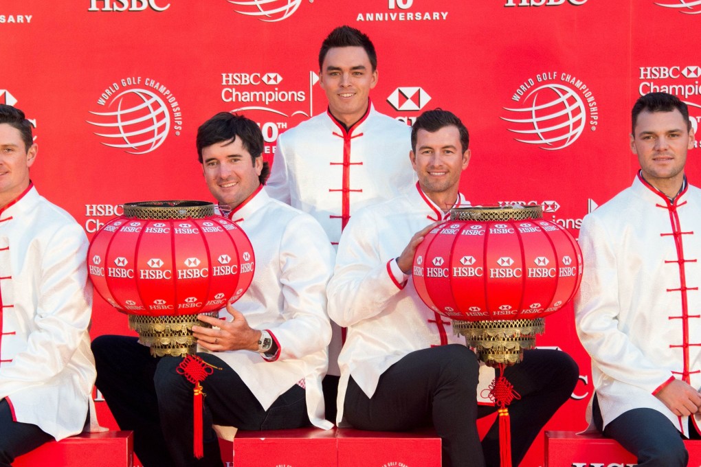 Justin Rose of England, Bubba Watson of the US, Rickie Fowler of the US, Adam Scott of Australia and Martin Kaymer of Germany wear traditional Chinese costumes as they attend a photo call for the WGC-HSBC Champions golf tournament on the historic Bund in Shanghai. HSBC is considering ending its sponsorship of its flagship golf tournament, the WGC-HSBC Champions in Shanghai last year. Photo: AFP