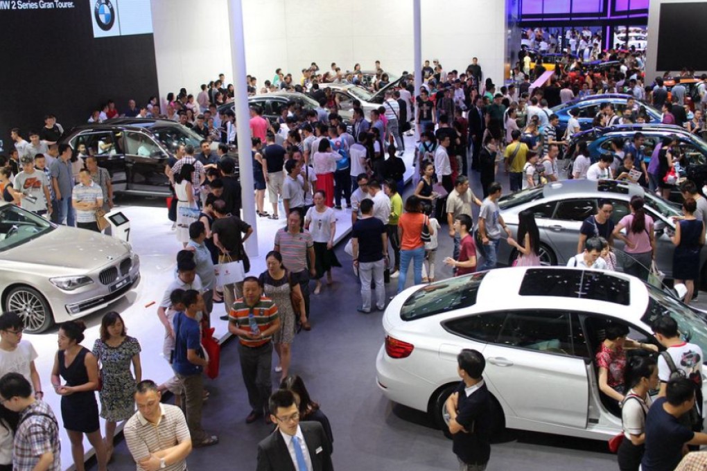 Car shows in Chengdu draw the crowds. Photo: ImagineChina