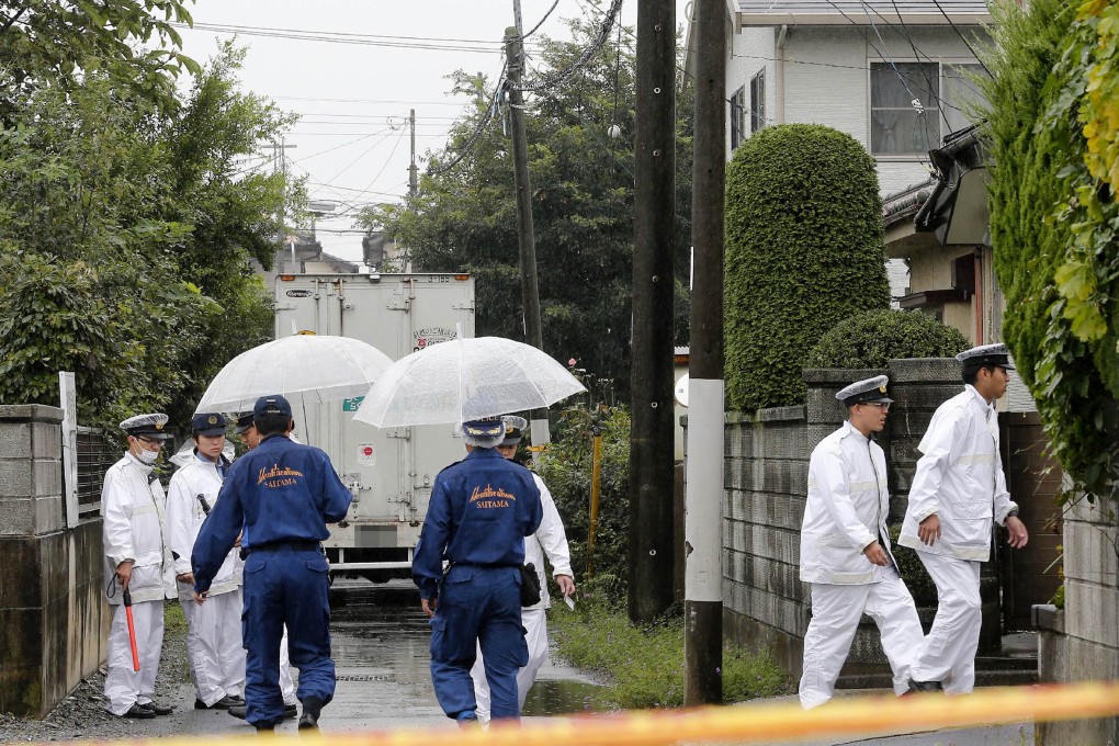 Police in Kumagaya investigate the murders of six people, found stabbed to death. A Peruvian man was being held in custody.  Photo: AFP/Jiji Press