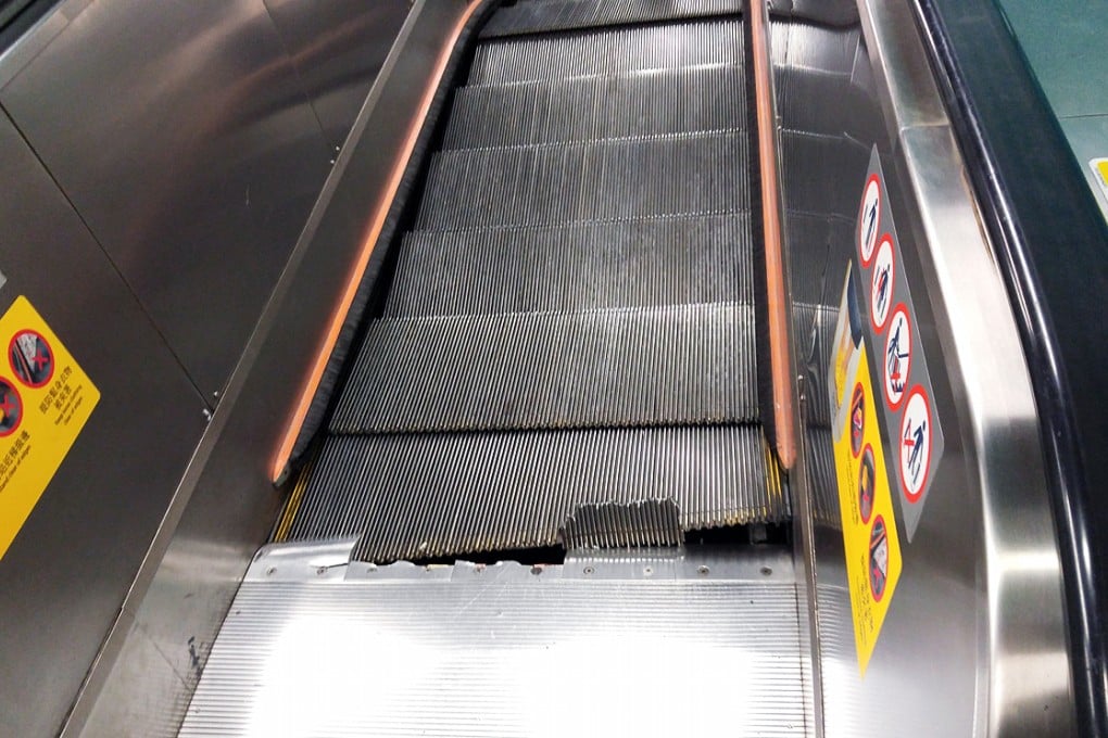 The damaged escalator at Quarry Bay MTR station