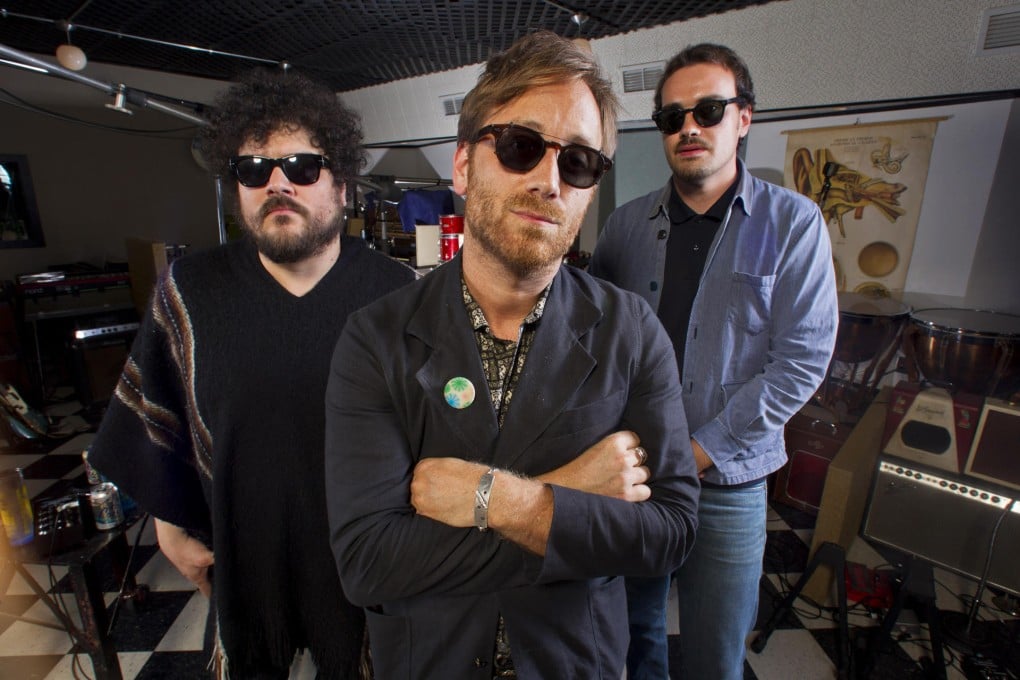 Dan Auerbach, center, Richard Swift, left, and Leon Michels of The Arcs. Photo: AFP