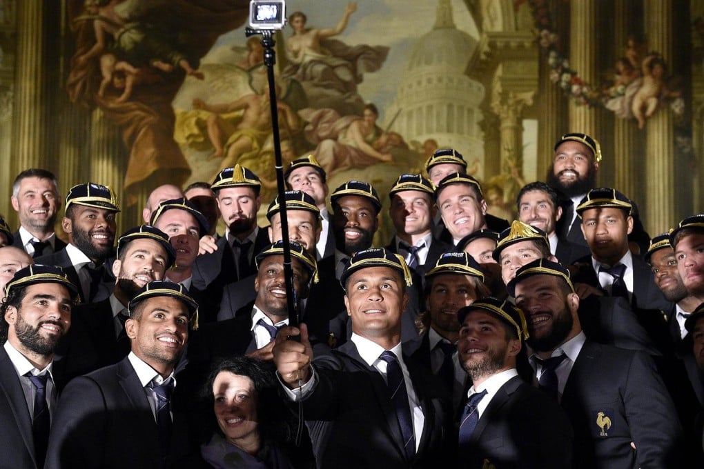 France players take a selfie at a welcoming ceremony at the Old Royal Naval College in Greenwich. France begin their campaign against Italy at Twickenham on Saturday. Photos: AFP