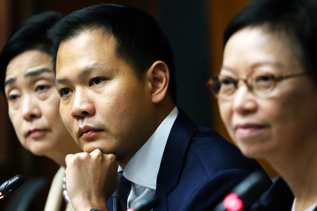 Group convenor Dennis Kwok (centre) said 22 pan-democrat lawmakers had agreed to apprise the group if a Beijing official asked them for a meeting. Photo: Felix Wong