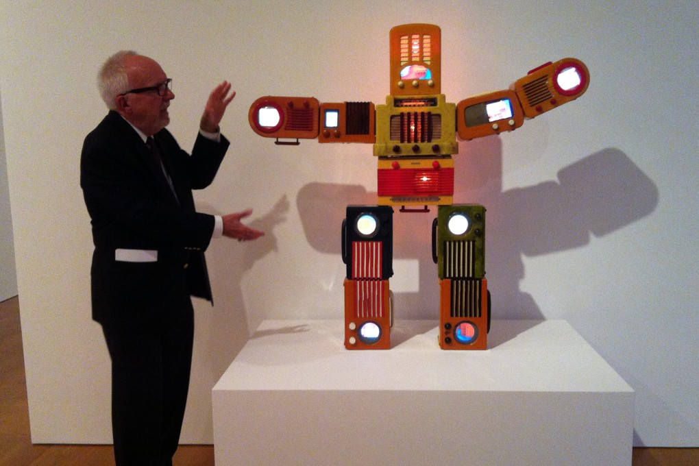 John Hanhardt, Paik’s friend, and Bakelite Robot.