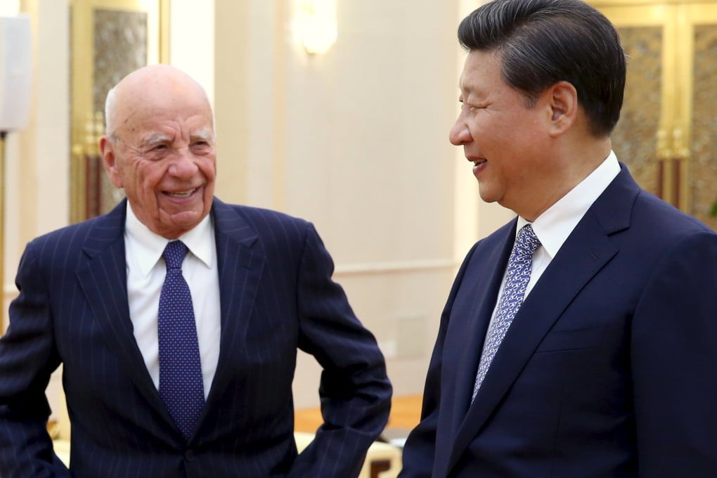 Chinese President Xi Jinping meets News Corp CEO Rupert Murdoch in Beijing. Murdoch pledged his media outlets would offer full coverage to Xi's trip to the US. Photo: Reuters