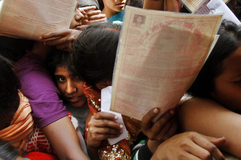 Unemployed Indians crowd outside the Employment Exchange Office to register themselves in Allahabad in the northern Indian state of Uttar Pradesh. Photo: AP