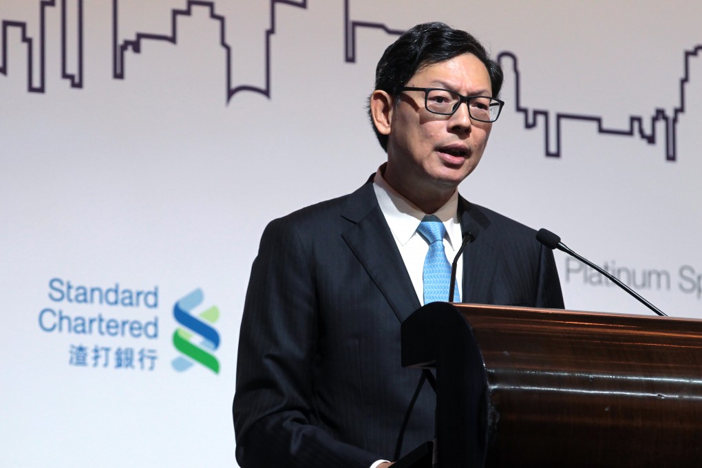 Hong Kong Monetary Authority Norman Chan says the US may not wait much longer before it increases the interest rate. Photo: Bruce Yan