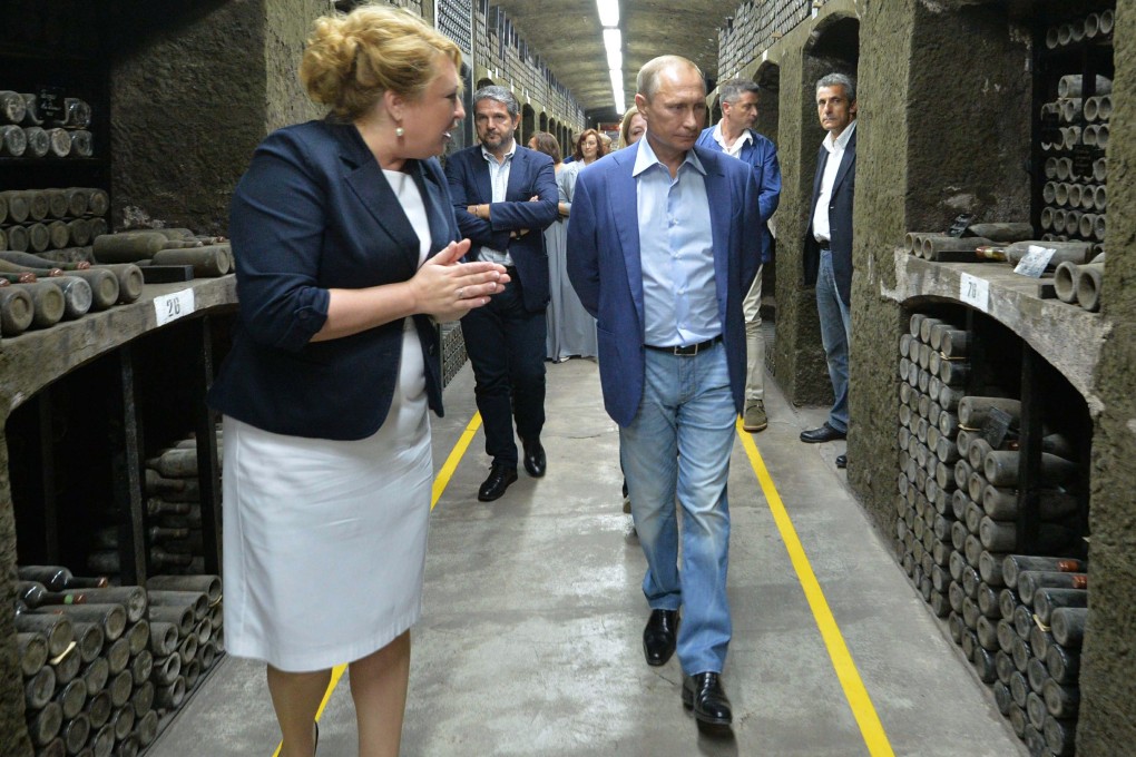 Russian President Vladimir Putin visits the state-owned Massandra winery in Yalta, Crimea. Photo: AP