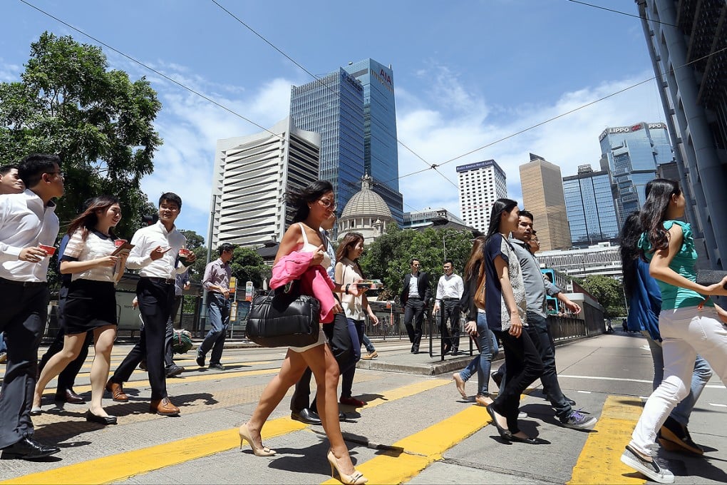 A quarter of Hong Kong's workforce clock 51 hours or more a week. Photo: Dickson Lee