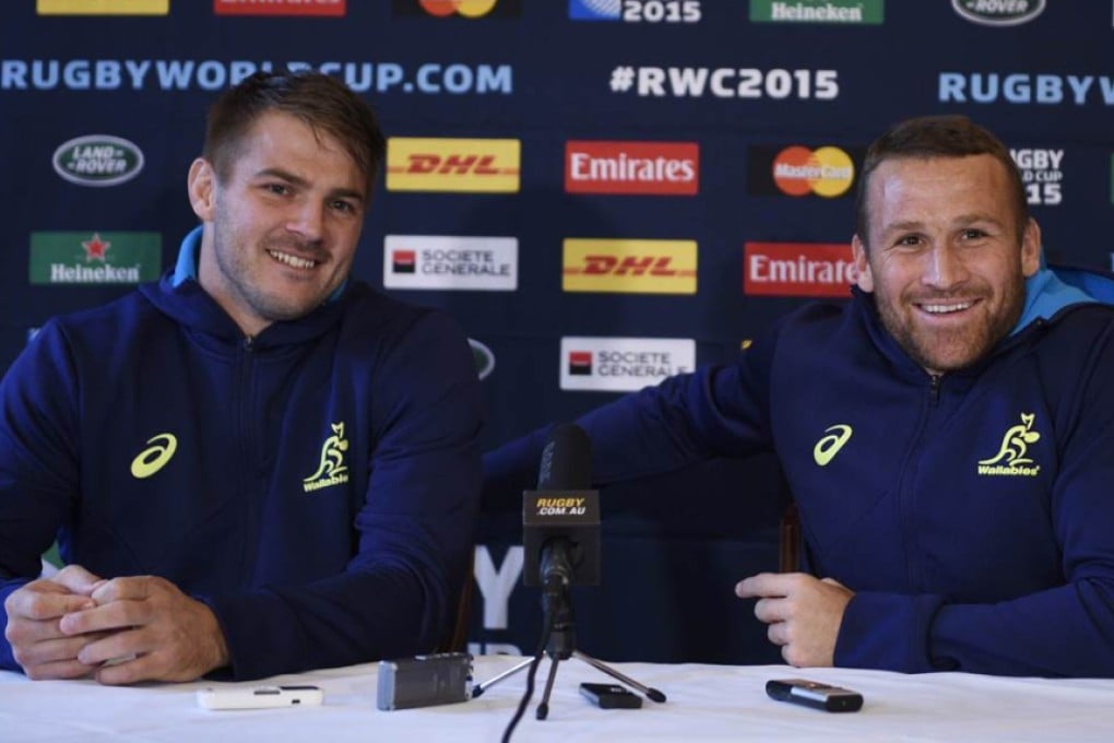 Australia and Toulon team-mates Drew Mitchell and Matt Giteau address the media at a press conference in Bath. Photo: AFP