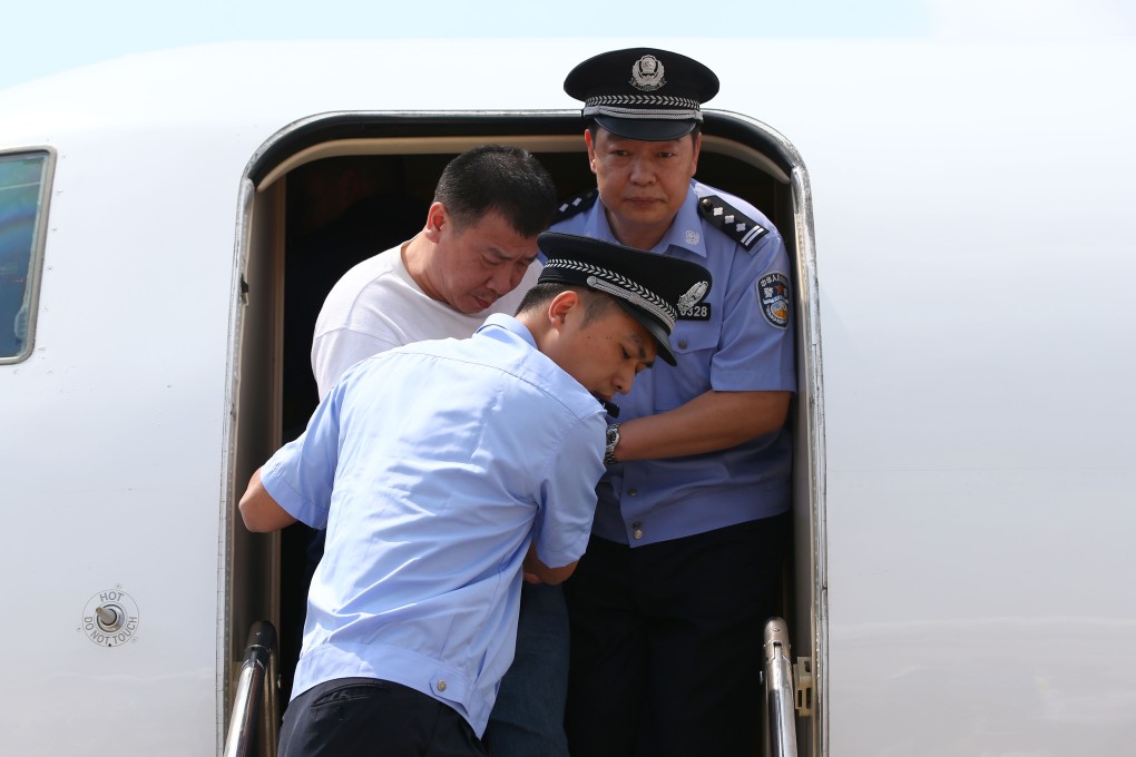 Yang Jinjun arrives back in China on Friday. Photo: Xinhua