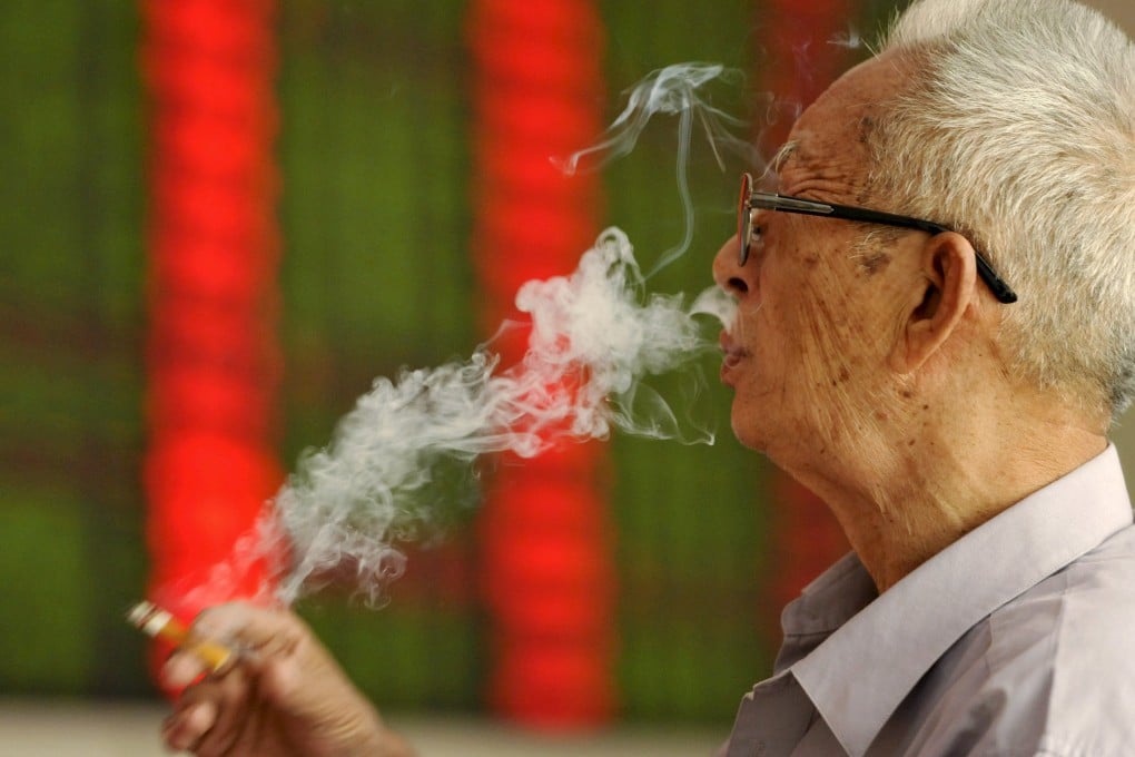 Beijing rolled out a smoking ban on June 1, forbidding smoking in restaurants, offices, on public transport and in any public place with a ceiling. Photo: Reuters
