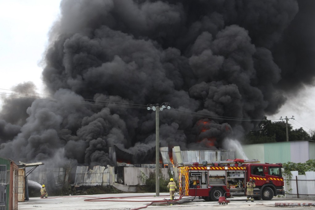 Smoke billows into the air at the recycling plant in Yuen Long. Photo: SCMP Pictures