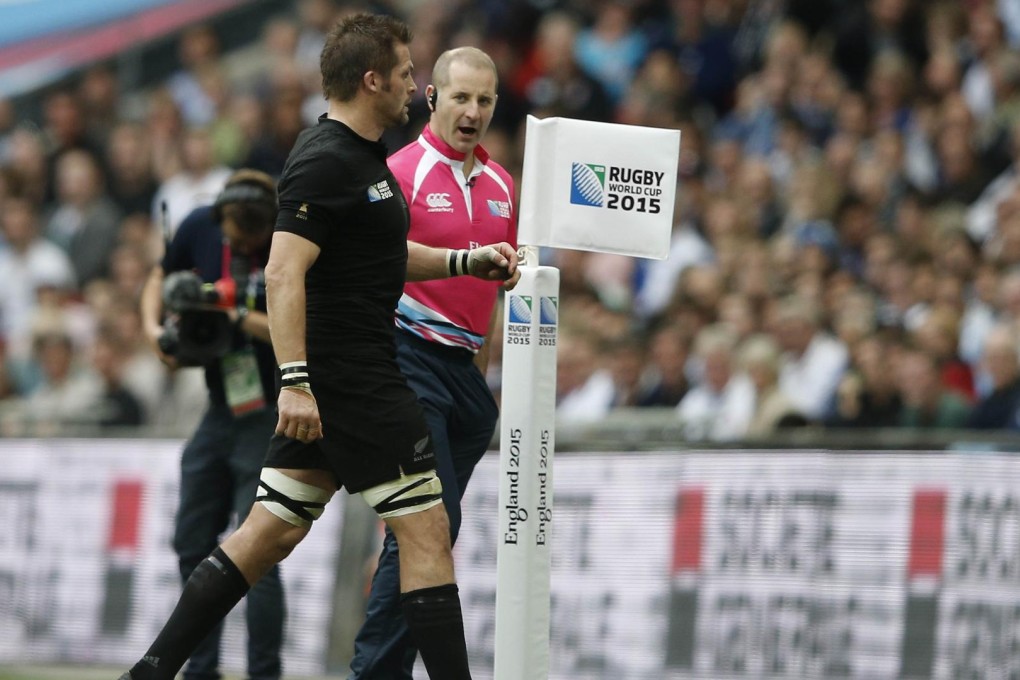 Marching orders: All Blacks captain Richie McCaw receives his yellow against Argentina. Photo: AFP