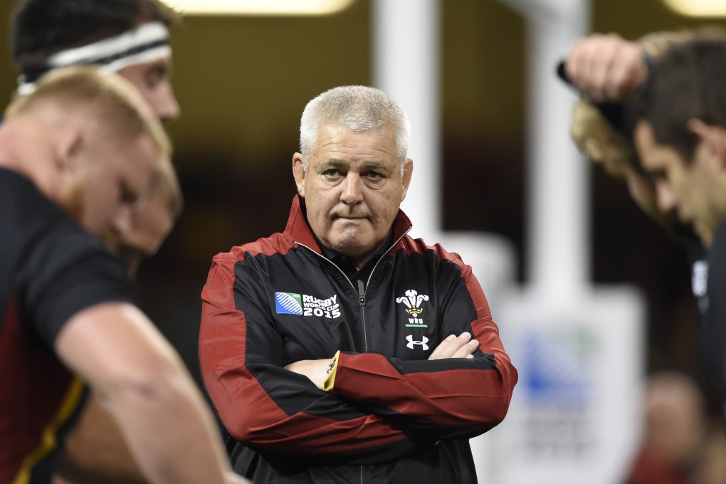 Wales coach Warren Gatland chats to his squad about their game plan. Photo: Reuters