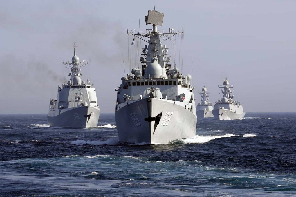 The Chinese destroyer Wuhan leads a fleet of naval ships ahead of a joint exercise with Russia in the Sea of Japan. At present, high-frequency lasers used to tackle missiles are the size of huge containers. Photo: AP