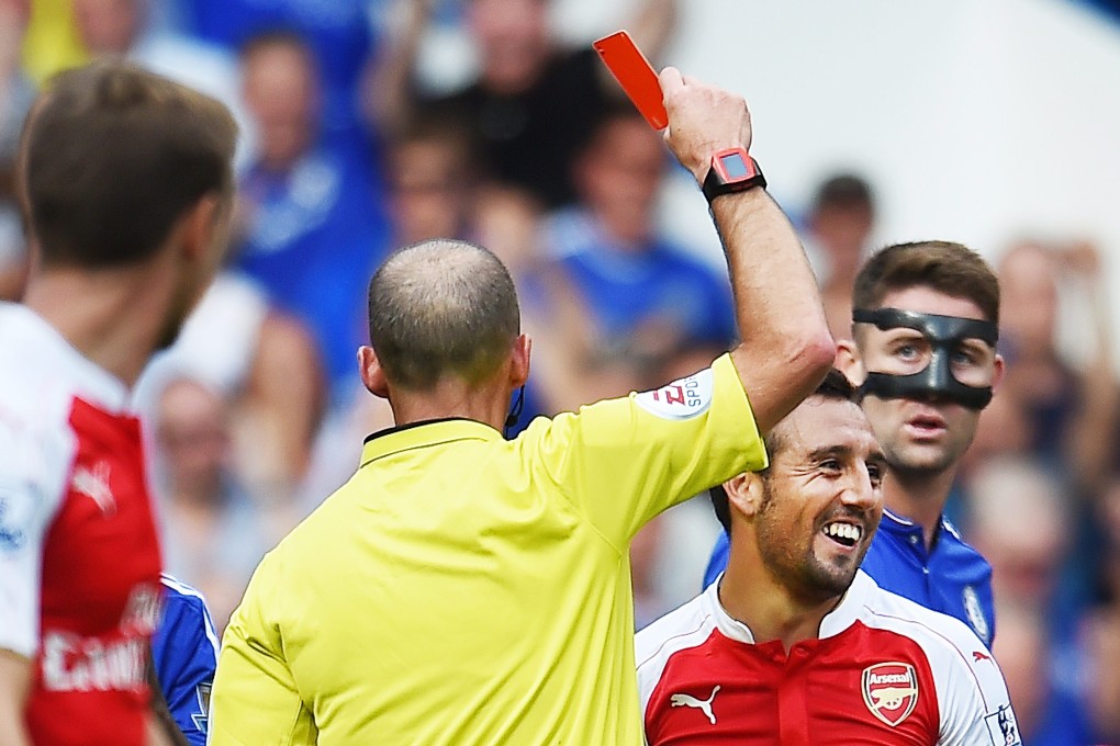 Santi Cazorla gets sent off against Chelsea. Photo: EPA