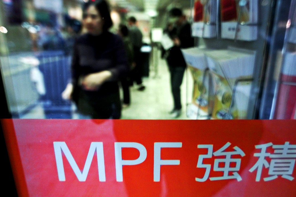 The signage of the MPF adorns a bank window in Hong Kong, where the retirement fund has been the subject of much criticism for allowing employers to use it for their severance packages. Photo: AFP