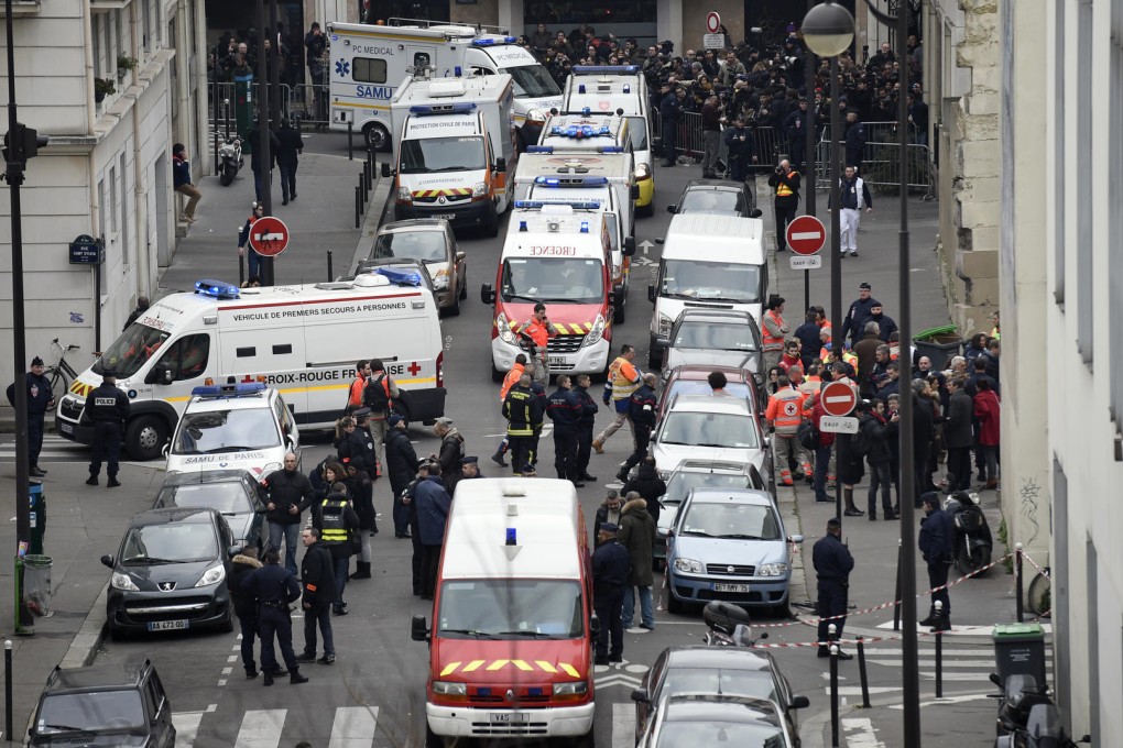 The scene outside Charlie Hebdo's offices in Paris immediately after the massacre. Photo: AFP