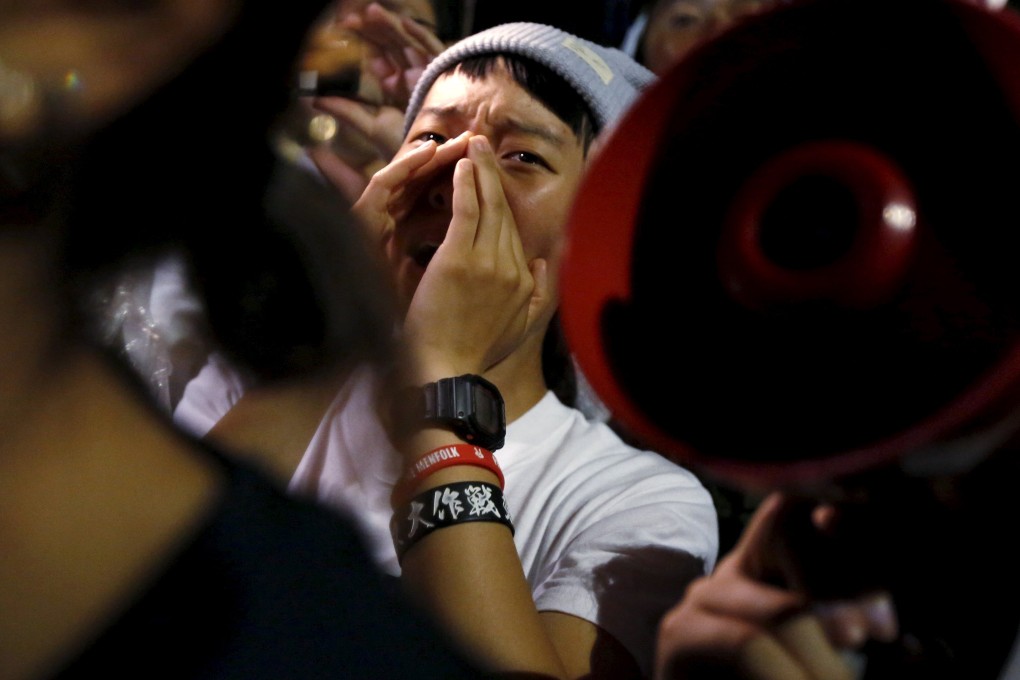Japanese protesters join a rally over the weekend against Prime Minister Shinzo Abe's security bill in front of the parliament in Tokyo. Photo: Reuters