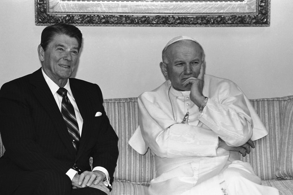 In this May 2, 1984 file photo, Pope John Paul II strike a pensive pose as he and President Ronald Reagan sit for photographers prior to having a private meeting in Fairbanks, Alaska at the airport. After the meeting Reagan left for Washington and the pope for South Korea.  Photo: AP