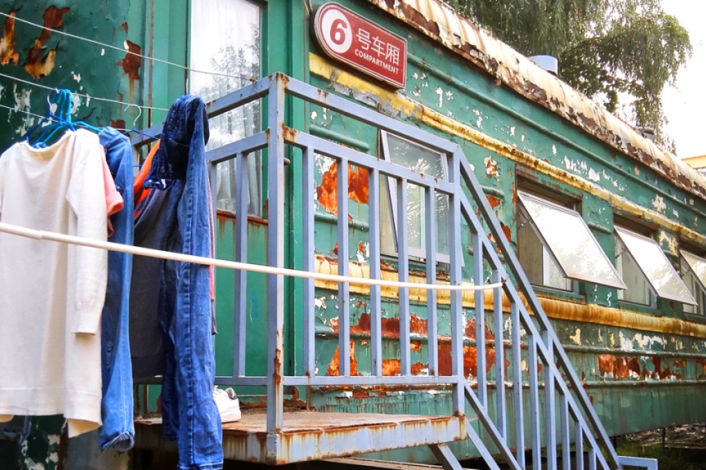Carriages from an abandoned – and somewhat weather-beaten – train have been turned into a student dormitory at a school in Zhengzhou, Henan province. While the carriages look a bit rough on the outside, it’s a different experience inside, with wood floors, storage space and air conditioning. But it’s the three or four double-deck bunks inside each carriage that take up most of the space. Photo: ImagineChina