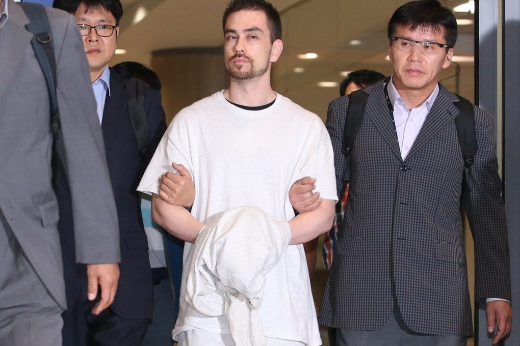 US national Arthur Patterson arrives at Incheon international airport after being extradited from the US for the murder of a South Korean college student in 1997. Photo: AFP