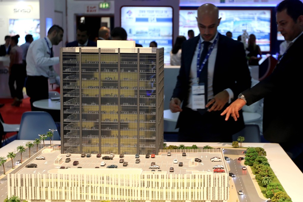 Prospective investors attend a property fair in Dubai. Residential properties are in high demand in the Middle Eastern city. Photo: AFP