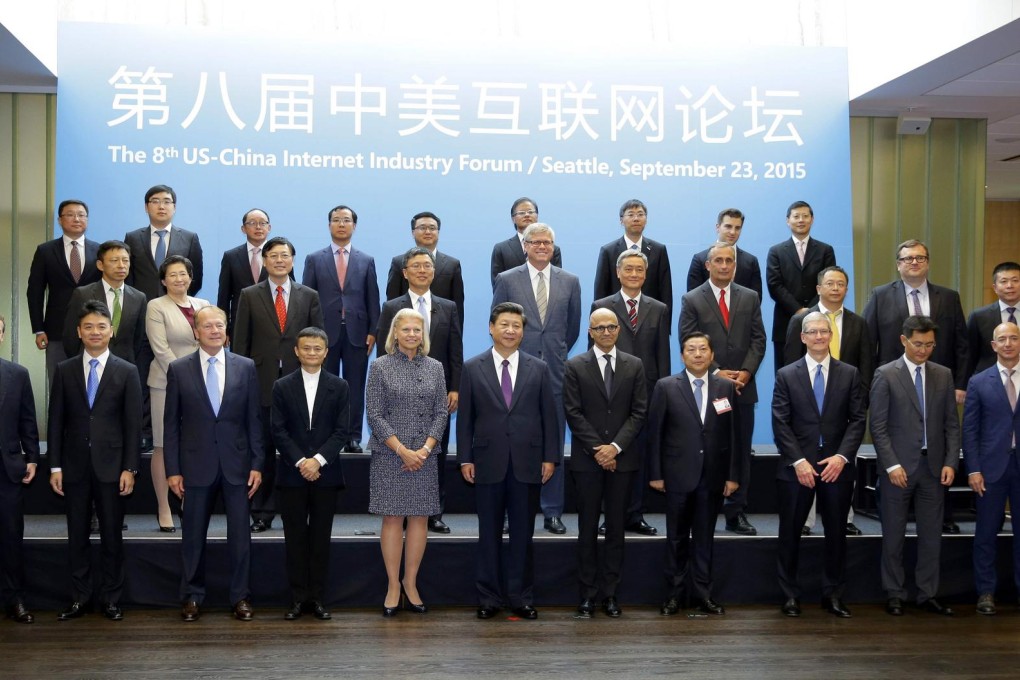 President Xi Jinping poses with CEOs and other executives at Microsoft's main campus on Wednesday. Photo: Reuters