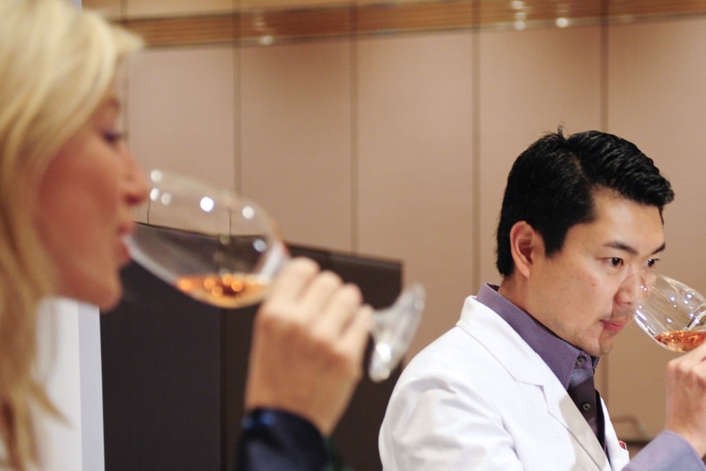 Debra Meiburg and Simon Tam tasting at the 2009 Cathay Pacific International Wine and Spirit Competition in Hong Kong.