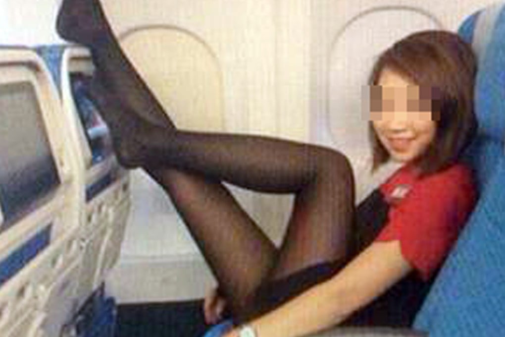 <P>The flight attendant strikes a sexy pose. Photo: SCMP Picture