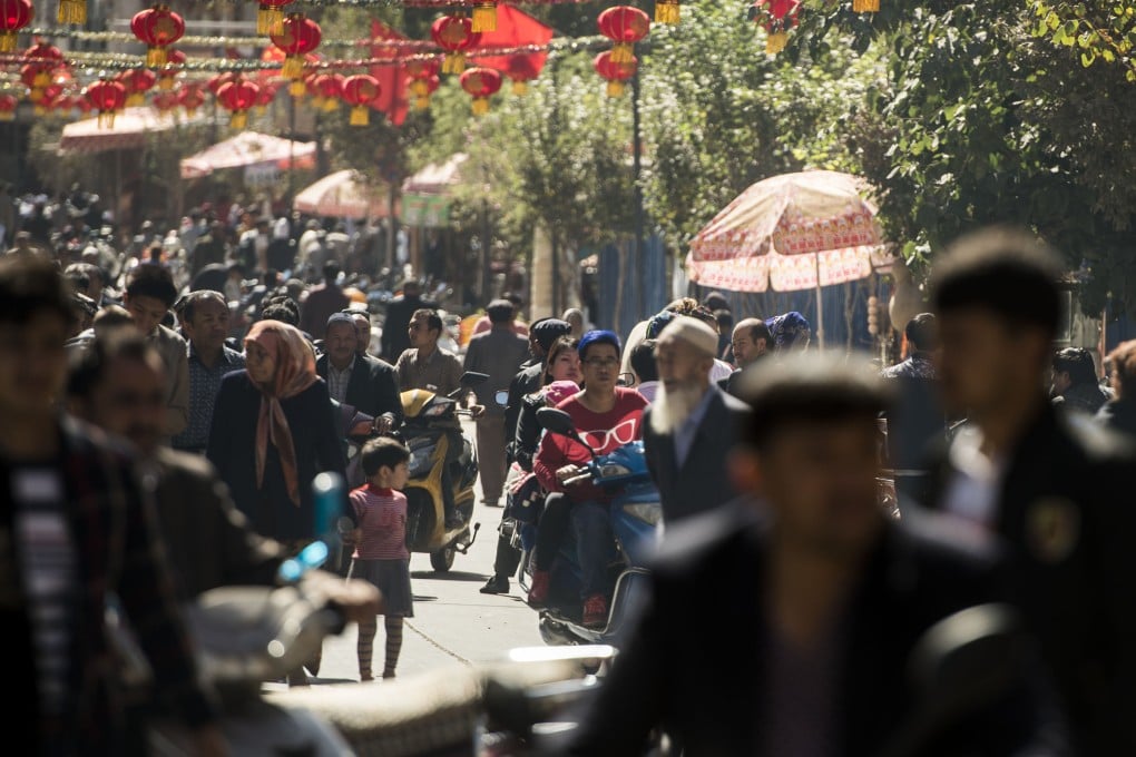 Residents shop in a bazaar in Kashgar, Xinjiang Uygur autonomous region. Uygurs account for about half of Xinjiang's population. Photo: Xinhua