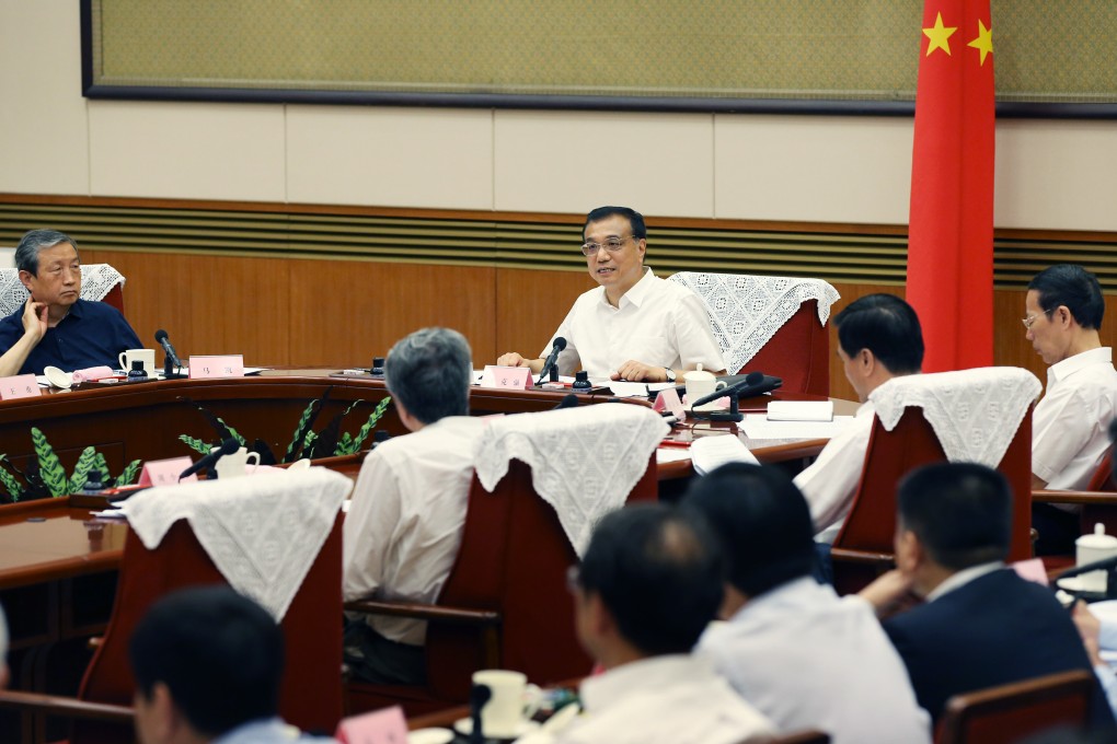Chinese Premier Li Keqiang presides over a meeting last week on reforms of state-owned enterprises (SOEs) in Beijing. Photo: Xinhua