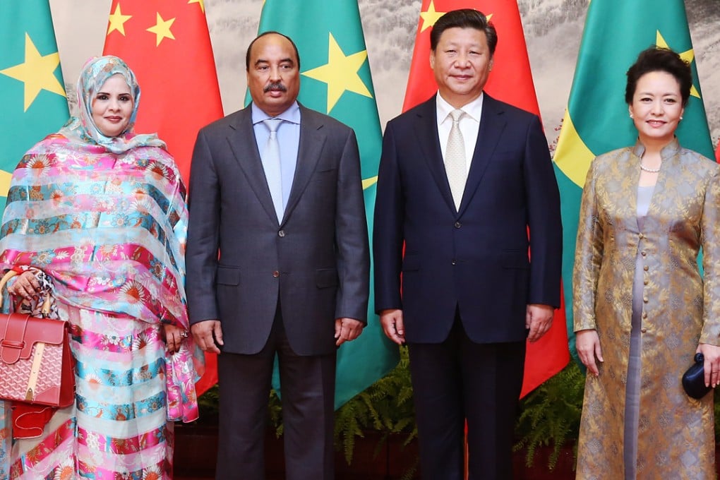 President Xi Jinping and his wife Peng Liyuan greet Mauritanian President Mohamed Ould Abdel Aziz and his wifein Beijing on September 14. Photo: Xinhua