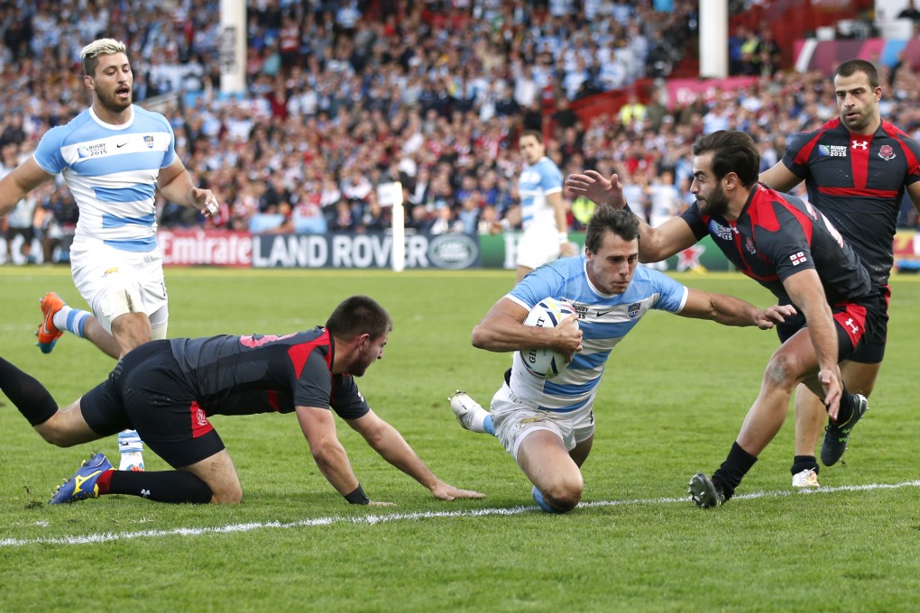 Juan Imhoff scores the seventh try for Argentina. Photos: Reuters