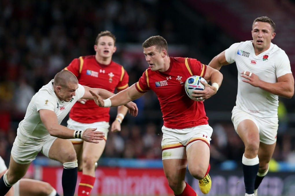 Wales' Scott Williams on the charge against England at Twickenham. Photo: Xinhua