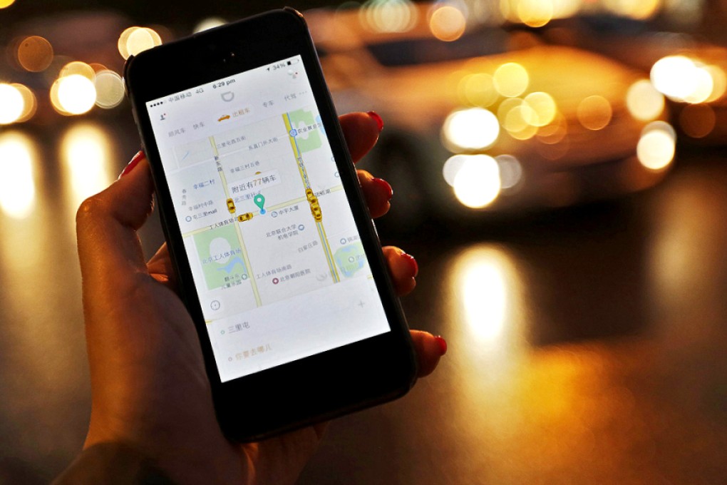 Didi Kuaidi poses the greatest threat to Uber, with 20 times more staff and avoiding confrontation with State-owned taxi companies. Photo: EPA